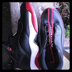 Some black and red Jordans
